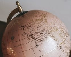 Pink globe sphere in a room