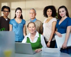 Portrait of group of people in office